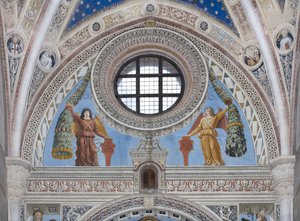 Ángeles con escudos rojos y decoraciones de Ambrogio da Fossano