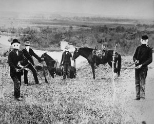 Granjeros de Nebraska cortando cercas de ganaderos en el condado de Custer de American Photographer
