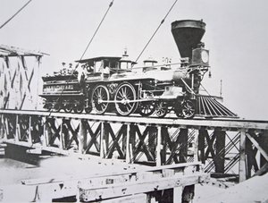 Locomotora de los Ferrocarriles Militares de EE.UU. (Ejército de la Unión) cruzando puente de caballetes sobre el río Potomac de American Photographer