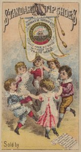 Niños bailando alrededor de una pancarta de American School