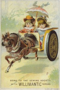 Niños viajando rápido en carro de caballos de American School