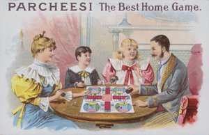 Familia jugando un juego de Parcheesi de American School