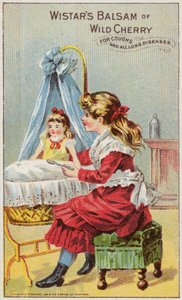 Niña dando medicina a su muñeca de American School