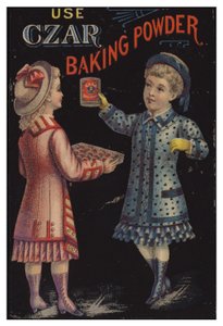 Niña sosteniendo lata de polvo de hornear de American School