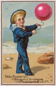 Niño marinero con globo rojo de American School