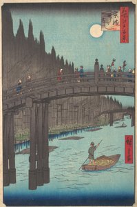 Luna llena sobre el canal, con puente y grandes pilas de bambú a lo largo de la orilla, ca. 1857 de Ando Hiroshige