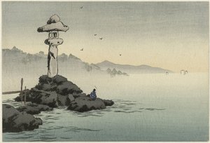 Linternas en una roca en la costa
