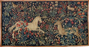 Unicornio y ciervo en un campo de flores de Anonymous master.