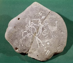 Piedra inscrita con un cazador en el desierto y una inscripción safaitica, siglo I a.C.-III d.C.