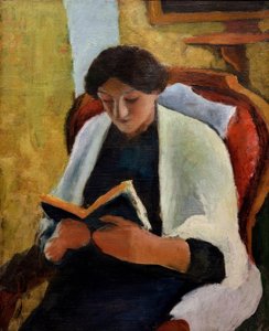 Mujer leyendo en el sillón rojo de August Macke