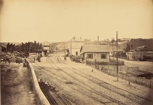 Paso a nivel y estación, L