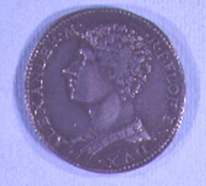 Moneda decorada con la cabeza de Alessandro de