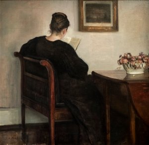 Interior, mujer leyendo de Carl Holsoe