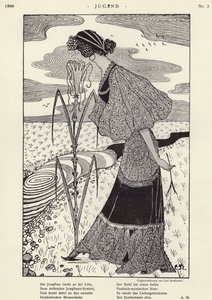 Mujer oliendo una flor