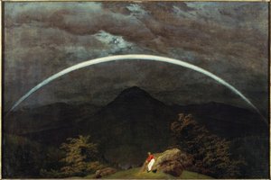 Paisaje montañoso con arco iris