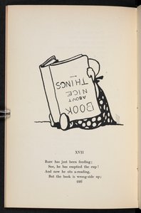 XVII.
Una rima. Un niño leyendo un libro al revés. de Charles Robinson