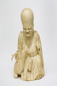 Figura de marfil tallada de Shou Xing sentado con un ciervo, c.1580-1644 de Chinese School
