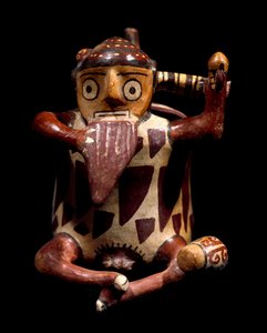 Arte precolombino, civilización Nazca: vaso antropomorfo representando a un músico tocando la flauta de pan de Culture Nazca