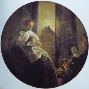 Una mujer cosiendo a la luz de las velas