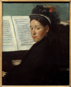 Mademoiselle Dihau, pianista de los conciertos Column, en el piano