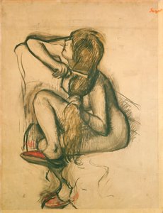 Mujer peinándose
