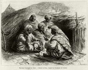 Un comerciante fascinando a un cliente, sentado en el suelo, en una pequeña estera, hace el artículo sosteniendo una balanza. Grabado de Riou, para ilustrar la historia Desde el Níger hasta el Golfo de Guinea, por el Capitán Louis Gustave Binger (1856-1936 de Edouard Riou