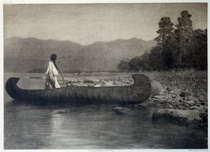 Indios de América: un indio en una canoa en el sur del lago Flathead, Montana de Edward Sheriff Curtis