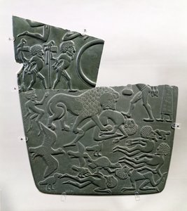 La Paleta del Campo de Batalla, que representa cautivos y víctimas de batalla, estas últimas presas de animales salvajes, Predinástico Tardío a la 1ª Dinastía, c.3100 a.C.