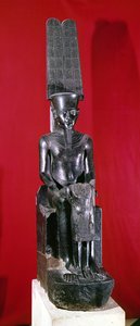 Estatua sentada del dios Amón protegiendo a Tutankamón, Reino Nuevo, c.1336-1327 a.C.