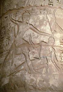 Ramsés sujetando a sus enemigos asiáticos por el pelo mientras se prepara para matarlos, relieve, Templo de Seti I, Kanais, Egipto, Civilización egipcia, Reino Nuevo, Dinastía XIX (foto) de Egyptian 19th Dynasty