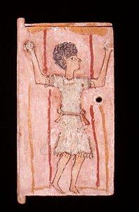 Niño haciendo malabares, puerta de un gabinete