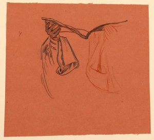 Estudio de manos sosteniendo un libro abierto con drapeado de ropa