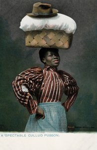 Niña negra con una cesta de ropa, coronada por un sombrero, en su cabeza de English Photographer