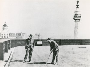 Golfistas de la ciudad vistos desde el Monumento de English Photographer