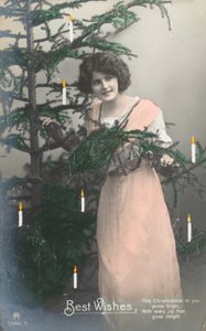 Niña y árbol de Navidad