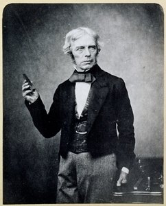 Michael Faraday (1791-1867) sosteniendo una barra magnética, por Maull y Polyblank de English Photographer