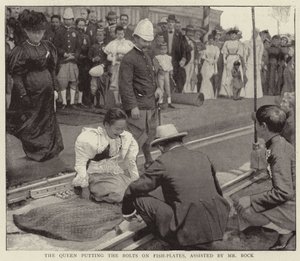 La Reina colocando los Pernos en las Placas de Pescado, asistida por el Sr. Bock