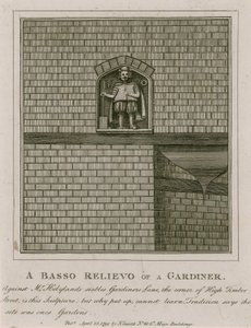 Un bajo relieve de un jardinero