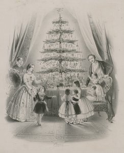 Una familia alrededor de un árbol de Navidad de English School