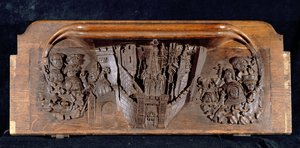 Una misericordia que representa una ciudad amurallada con una puerta con una reja levantada, Capilla del New College, Oxford, finales del siglo XIV (madera)