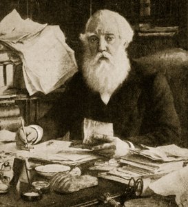 Austen Henry Layard sentado en su escritorio de English School