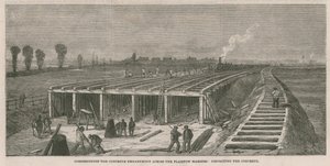 Construcción del terraplén de concreto a través de los pantanos de Plaistow