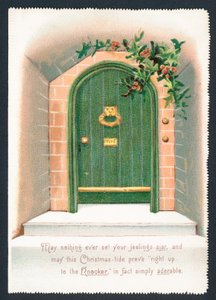 Puerta verde rodeada de acebo, tarjeta de Navidad