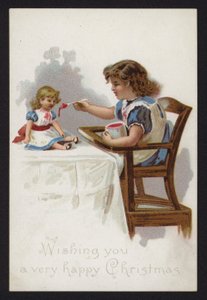 Niña pequeña jugando a alimentar a su muñeca, tarjeta de felicitación navideña, finales del siglo XIX o principios del XX