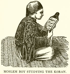 Niño musulmán estudiando el Corán de English School