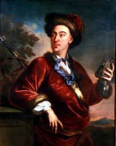 Retrato de un caballero sosteniendo un pájaro muerto