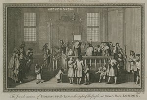 El medio judío de sostener la Ley a la vista del pueblo en Dukes Place, Londres