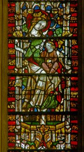 Ventana E1 que representa a la Virgen María de English School