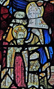 Ventana Ew que representa a Santa Ana, Joaquín, la Virgen María y el Niño Jesús