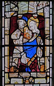 Ventana Ew que representa a Santa Ana, Joaquín, la Virgen María y el Niño Jesús de English School